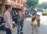 Bhabinkamtibmas Polsek Kota  Sosialisasikan Tarif Parkir kepada Warga Kota Pekanbaru