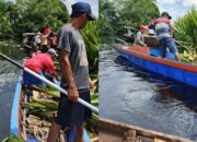 Pemdes Bandar Jaya Gotong Royong Membersihkan Sungai Siak Kecil
