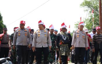 Ekspedisi Merah Putih Polda Riau Kibarkan Bendera 81 Meter di Pesisir Kampar